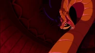 Jafar readying to strike Aladdin with his fangs.
