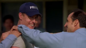 Sisk and his friends laughing after Mange fails the physical examination again