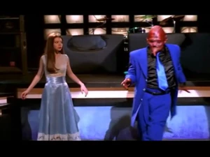 Sweet dancing in front of Dawn in her blue dress.