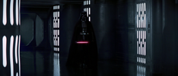 Vader stood at the end of the hall leading to Docking Bay 327, lightsaber already ablaze and awaiting Kenobi.