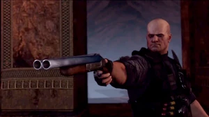 Zoran Lazarević holding his shotgun.