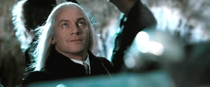 Lucius threatening Harry and the Weasleys.