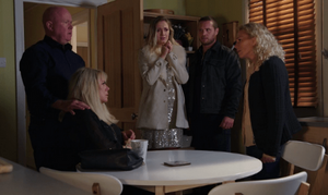 Phil and Sharon are confronted by Lisa over Mel's death in front of Louise and Keanu (2019).