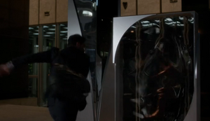 Scudder traps Barry inside a mirror
