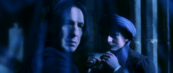 Harry witnesses Snape threatening Quirrell