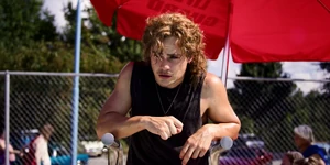 Back in the present, a dazed Billy watches swimmers in the community pool.