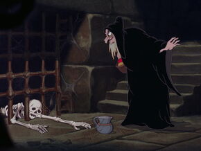 "Thirsty? Have a drink!"-Grimhilde taunting a skeleton of a dead prison.