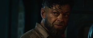 Klaue defends himself from the Maximoffs.