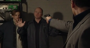 Phil pleads with Dan not to hurt Jamie as their confrontation gets out of hand (2001).