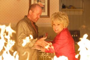 Phil sets fire to The Queen Vic in front of Peggy in the episodic "Queen Vic Fire Week" scenario in 2010.
