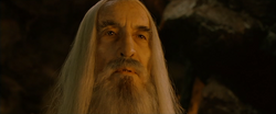 Saruman witnessing the birth of Lurtz, leader of the Uruk-hai