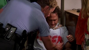 Sisk completing the "R" in "LOSER" on Marvin Mange's shirt