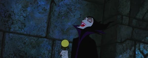Maleficent laughing wickedly when Phillip angrily tries to attack her, only to be prevented by his chains.