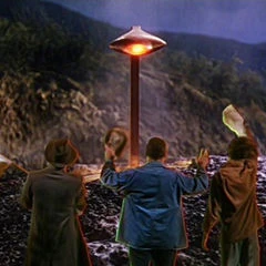 A group of humans wave the white flag before a Martian ship.