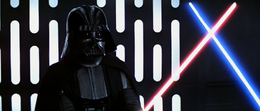 Darth Vader sees Kenobi raise his lightsaber so the tip pointed straight up, deliberately lowering his guard and ceding the duel.