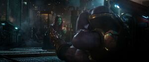 Thanos reaches out to Gamora.