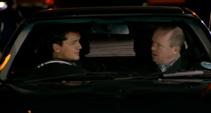 Phil demands that Dan relinquish his co-ownership of the pub back to him and becomes incensed when the latter refuses to do so (2000)