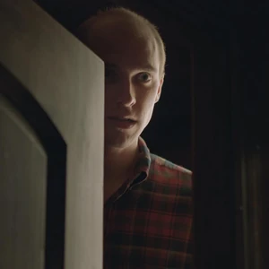 Paul stands up, revealing his tall stature to John Marshall.