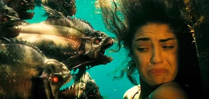 A scene of the piranhas appearing in front of Kelly, before Jake sets off the explosion. (Scene was only shown in the trailer of the film.)