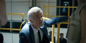 Brenner talking to Eleven as some scientists get ready to put her in the sensory deprivation tank.