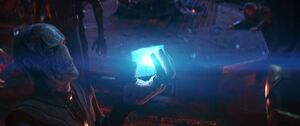 Maw hands Thanos the Tesseract.