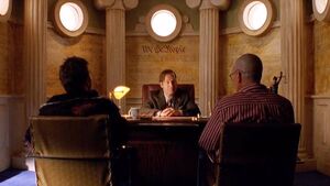 Saul with Walter White and Jesse Pinkman in his office.