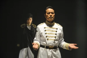 Adonis is approached by his son Adel.