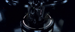 In his private quarters, Vader bows as he receives a holographic message from the Emperor.