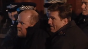 Phil Mitchell naturally gets himself arrested by the police for his criminal activities.