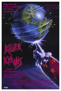 Slim's hand in the film's poster spinning the planet Earth