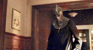 Tom walks up to an injured Rachel.