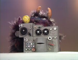 The monster eating a machine in a "Muppet Show" episode.