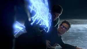 Thawne being attacked by Farooq before being saved by Barry.