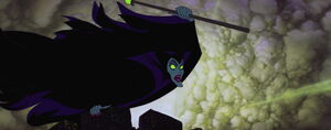 Maleficent using her powers to attack Phillip as he rides his horse to get to King Stefan's castle.