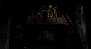 Smokey and his gang watch Stuart escape through the sewers.