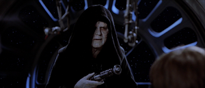 Palpatine holds Luke's lightsaber explaining that his father was irredeemable and could never be turned from the dark side.