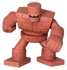 A vinyl figurine of the Golem.