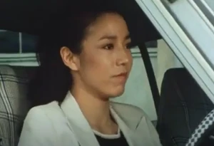 Oomura driving away in the real teacher's car.