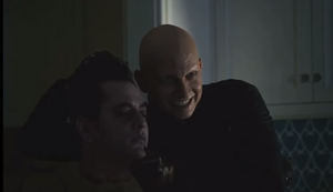 Zsasz with a guard of Loeb whom he murdered