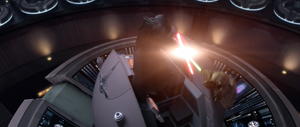 Sidious and Yoda strike their lightsaber together in a blade-lock.