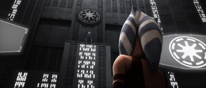 Palpatine presides over the court serving as the judge of the trial.