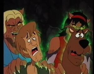 Simone and Lena attempting to steal Shaggy and Scooby's life forces.