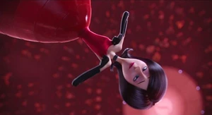 Scarlet rolling up her "papayas"