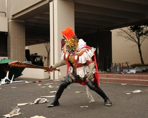 Urga Alexander wielding his sword.
