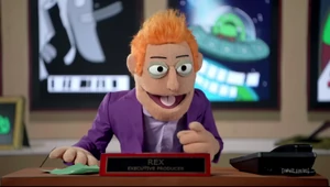 Smiling Friends Rex April Fools.png (944 KB) Rex as a puppet in the April Fools puppetry remake.