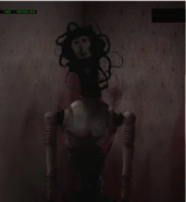 The Locust standing in the middle of his room.