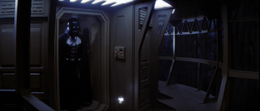 Vader enters the interior of the Endor shield generator bunker.