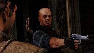 Zoran Lazarević angrily aims his pistol at Elena and Chloe.