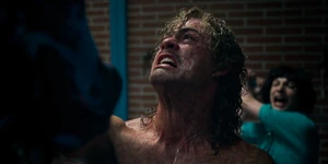 Billy about to be attacked by Mike.