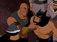 Ubu trying to remove Batman's mask